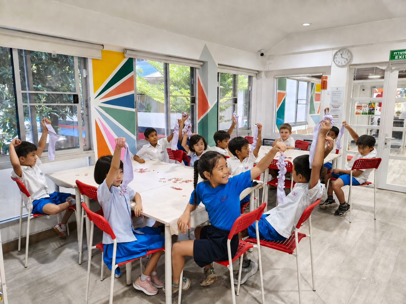 Students taking part in a cloth and ribbon craft activity