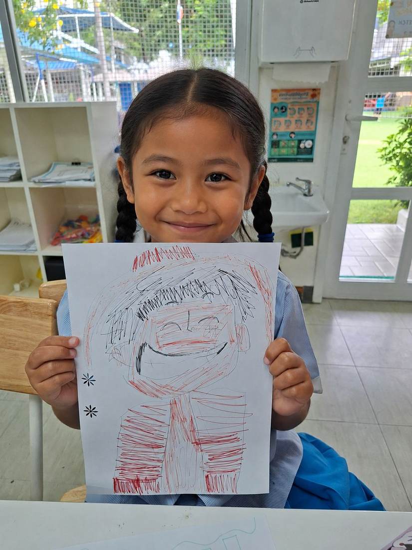 Students practising cartoon drawing techniques during Cartoon Drawing Club
