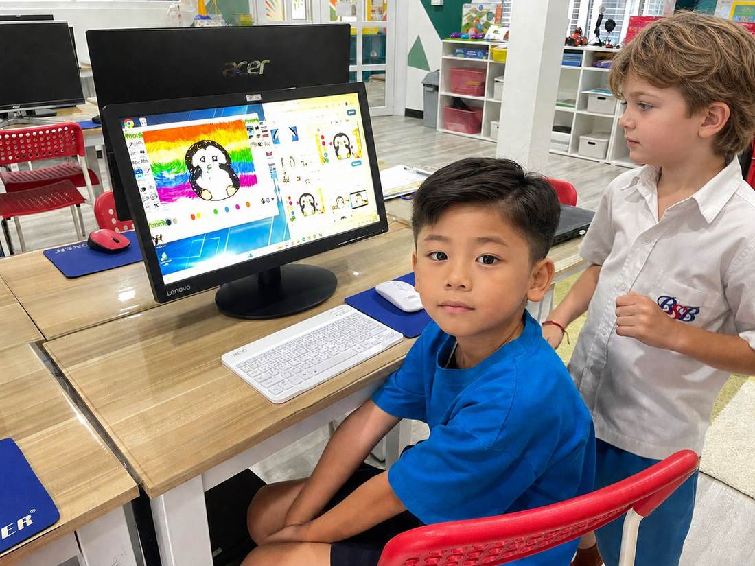 Students working together at the computers during ICT / Computing / Coding / Computer Animation