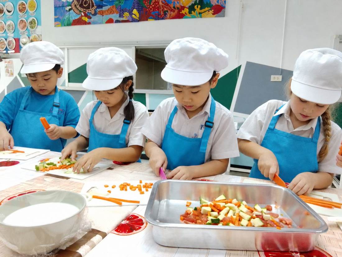 Students preparing food together during Cooking Club