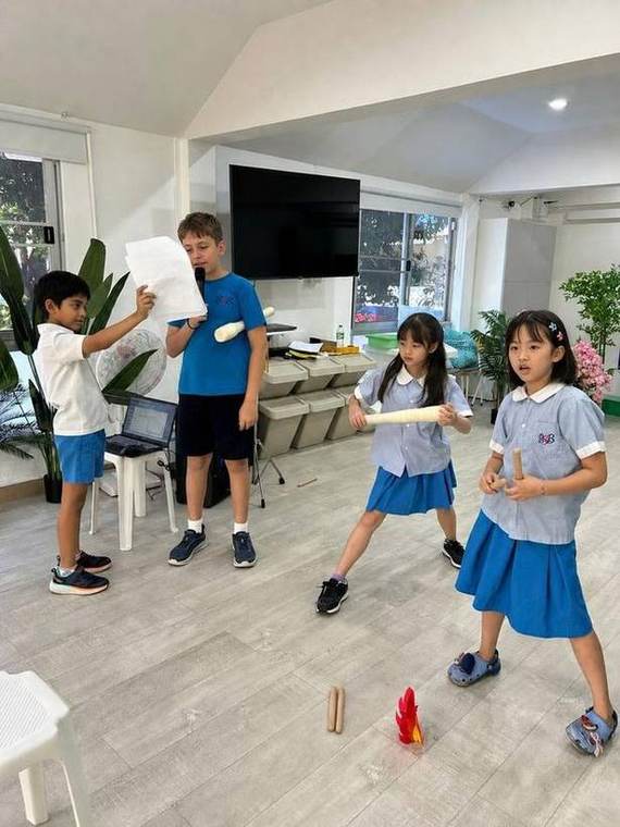 Students rehearsing a scene with props during Musical Theatre