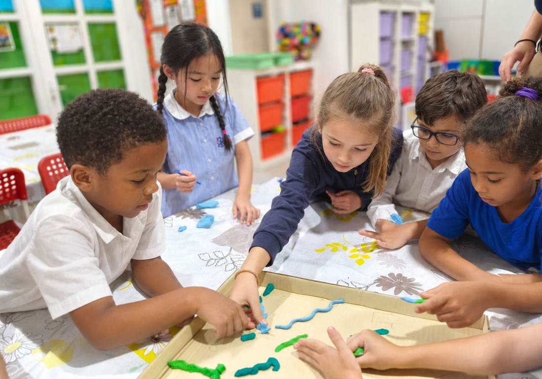 Students building a STEM project together during STEM Club