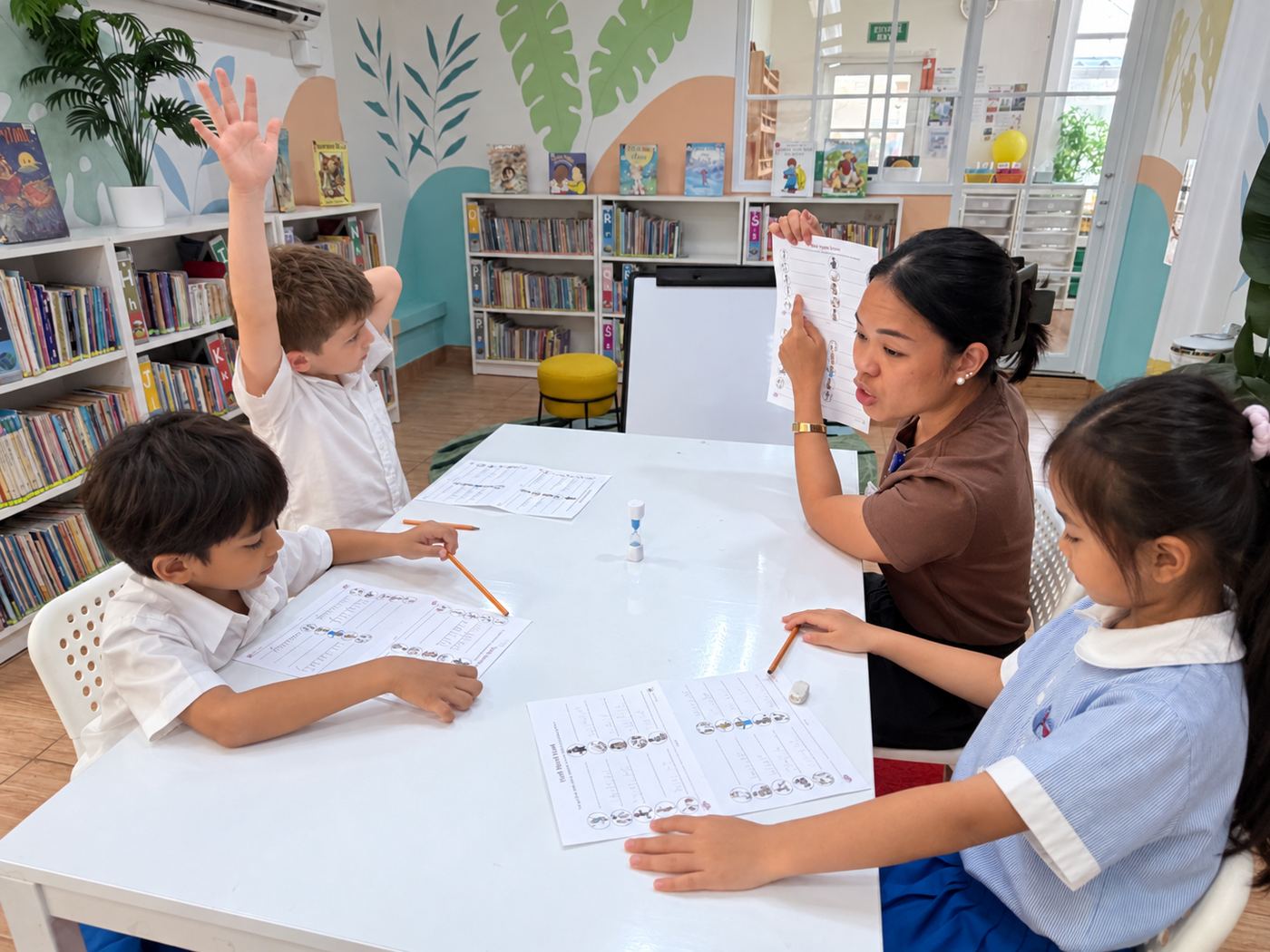 Students taking part in a small-group English language session
