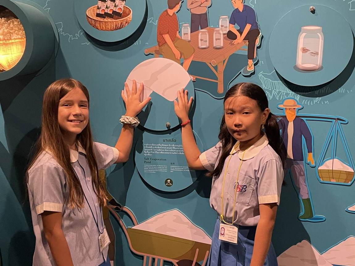 Students exploring a museum exhibit on the field trip