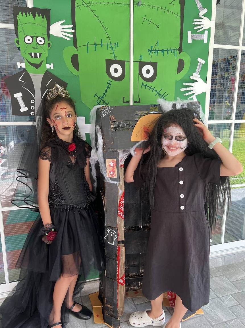 Students in elegant Halloween costumes