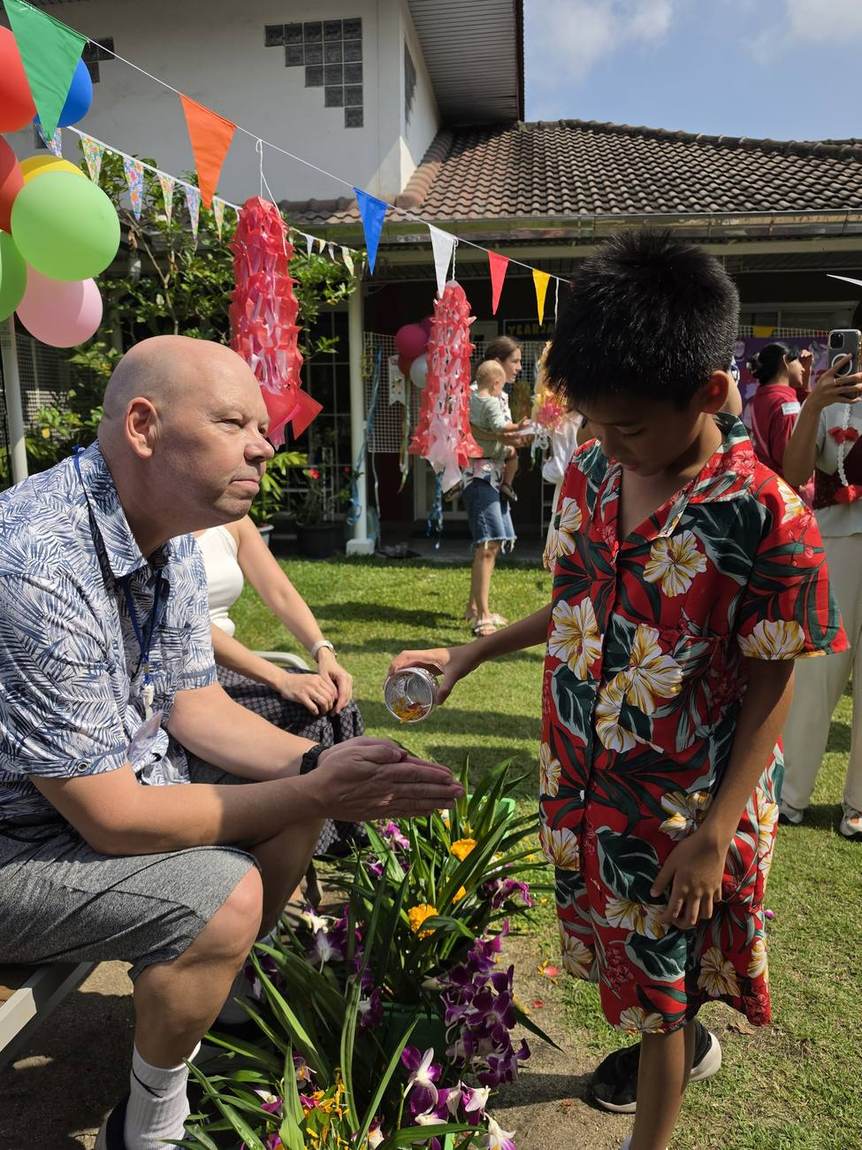 A family enjoying the Songkran celebration together