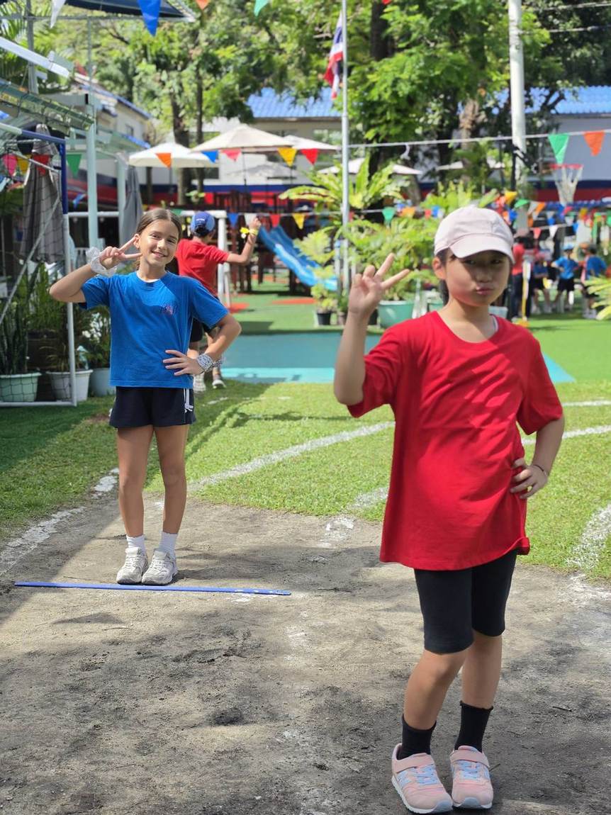 Students taking part in a ring toss relay on Sports Day