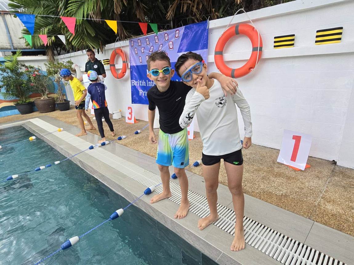 Students racing during the Swimming Competition
