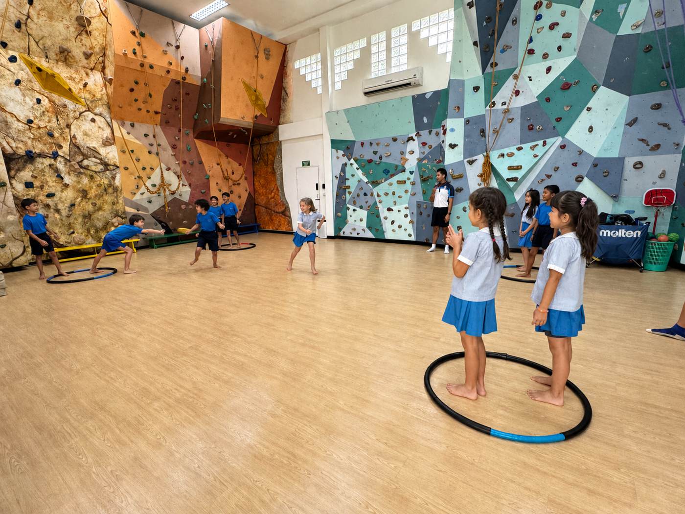 Students taking part in a group games session in the gym