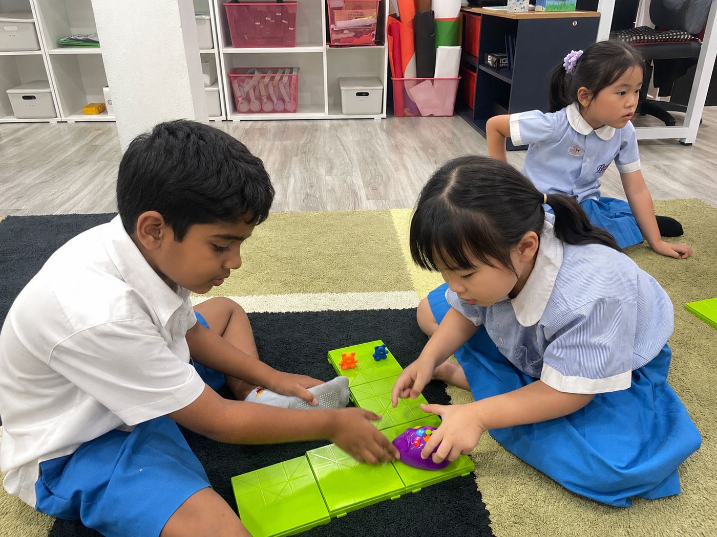 Students taking part in a hands-on coding and robotics activity