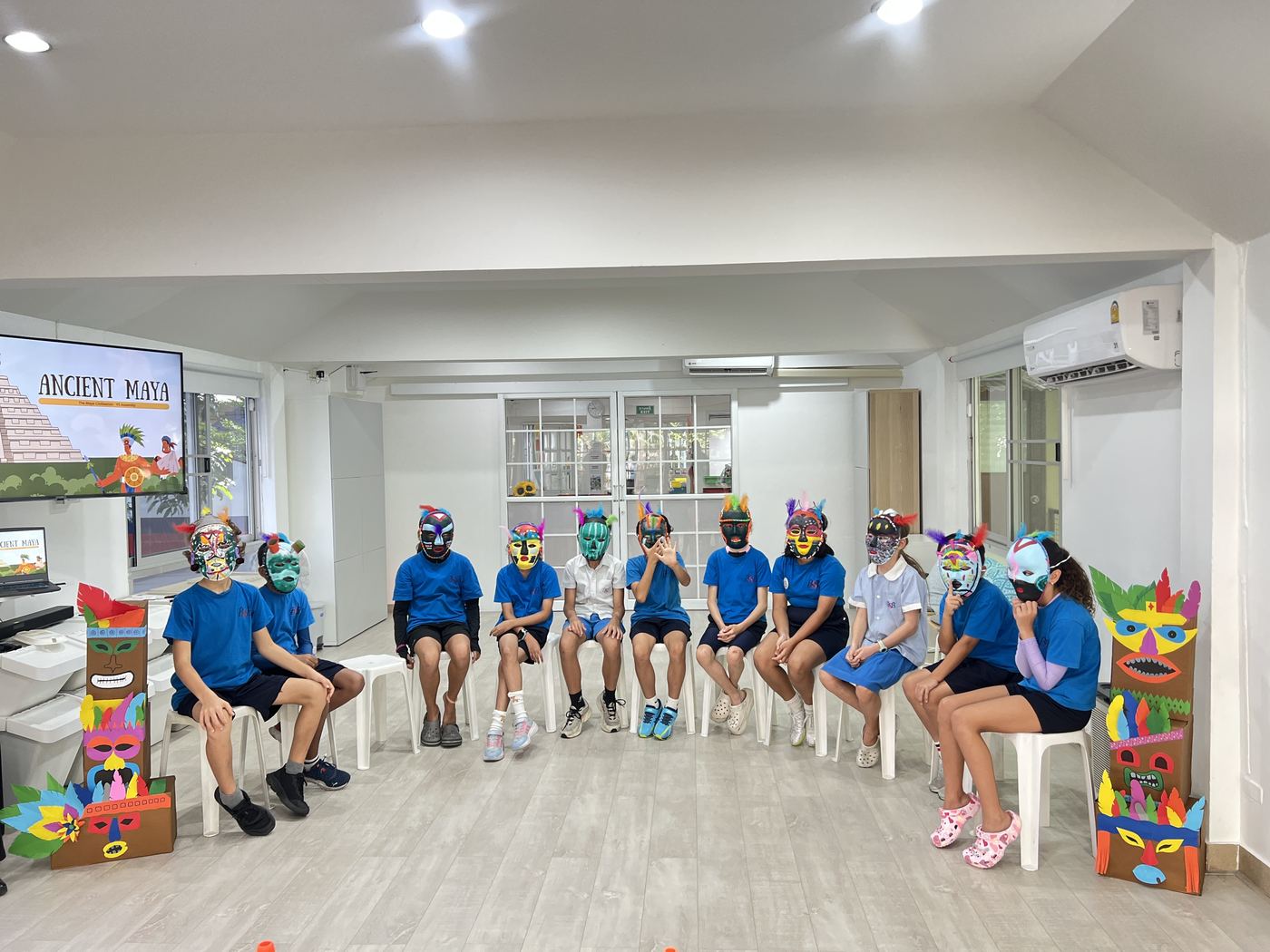 Students taking part in a class assembly in the Multi Function Room