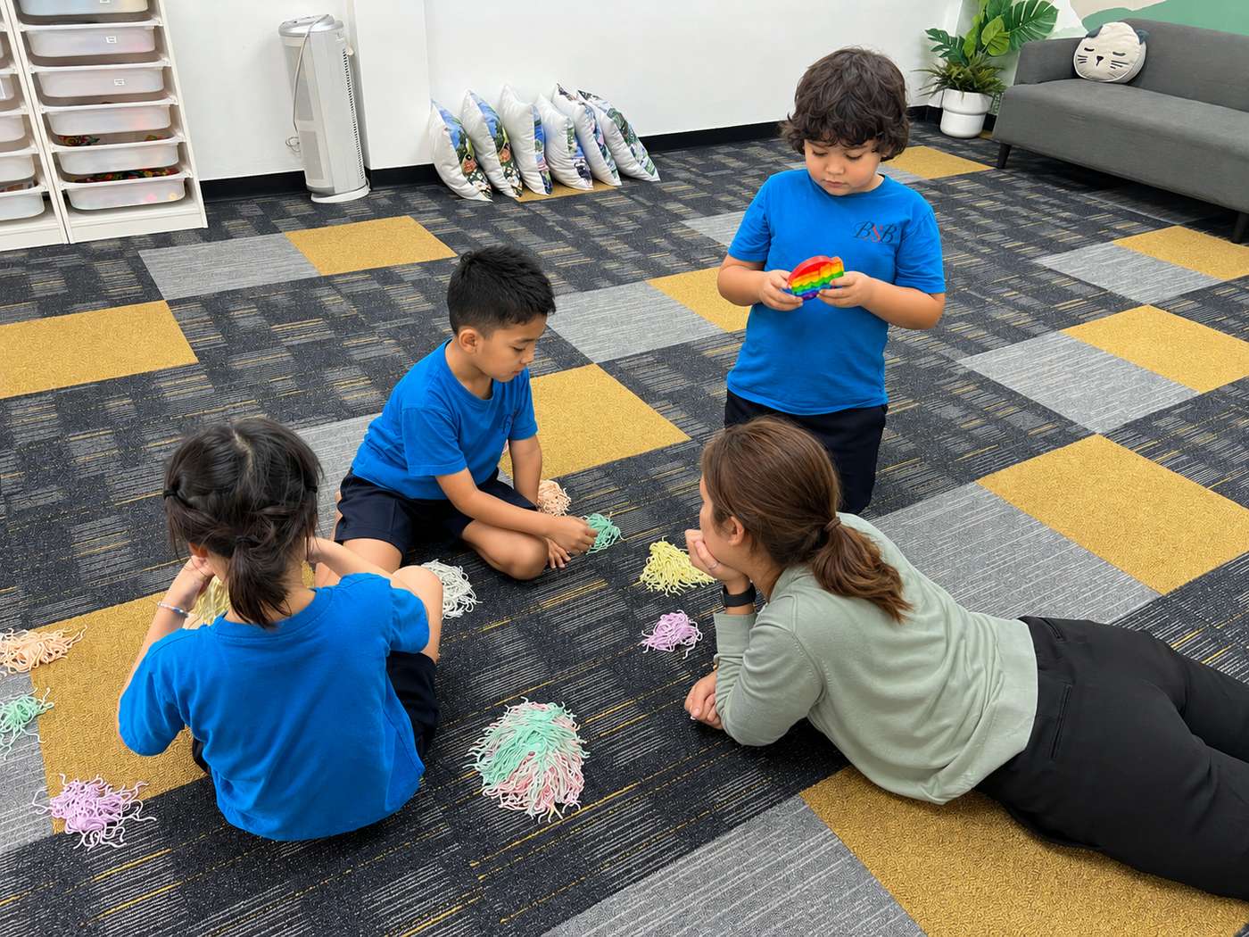Students exploring tactile sensory play together